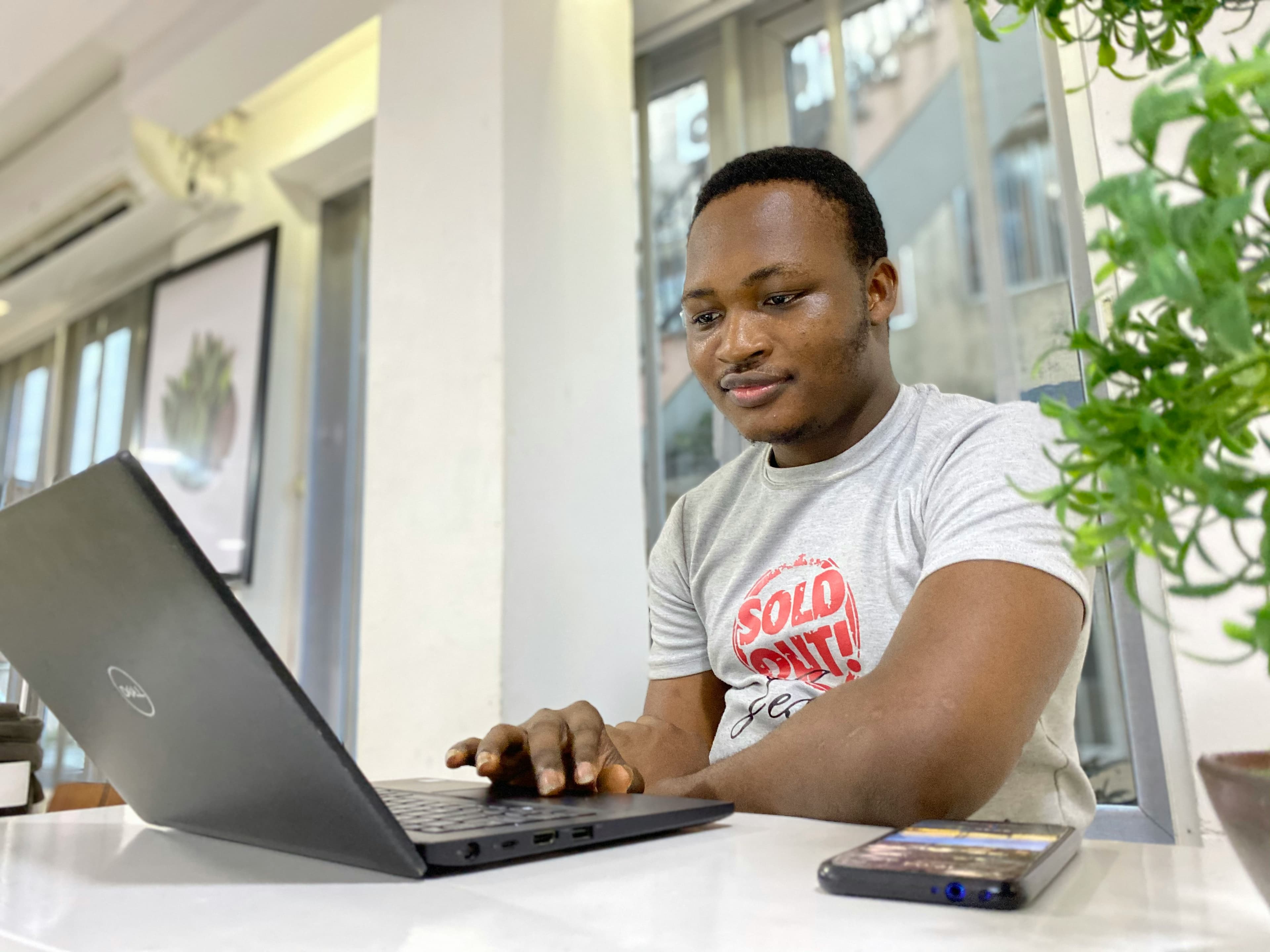 Personal loan applicant using a laptop